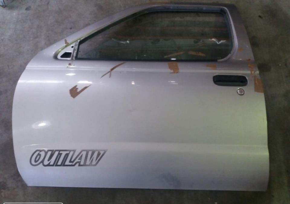 Peças - Porta Frente Esquerdo Nissan Navara D22 2003